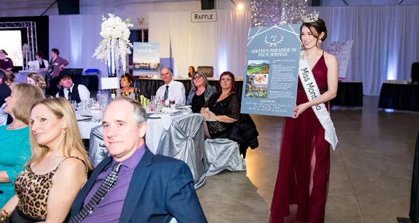 Guests enjoying the evening at a table at Paint the Town PINK
